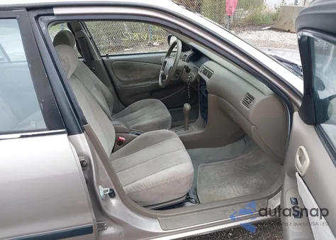 1999 Chevrolet Prizm Lsi from USA, damaged, VIN 1Y1SK5488XZ446933